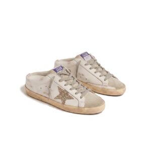Golden Goose Super-Star Sabot with a platinum glitter star and suede tongue